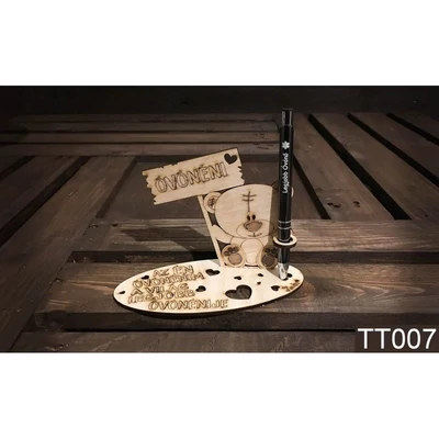 Tolltartó - Macis, Óvónéni